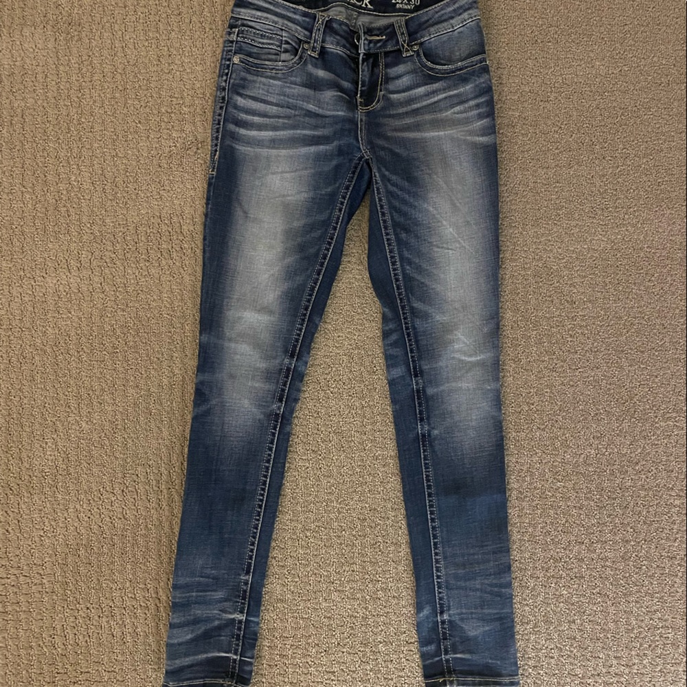 Buckle Skinny Jeans